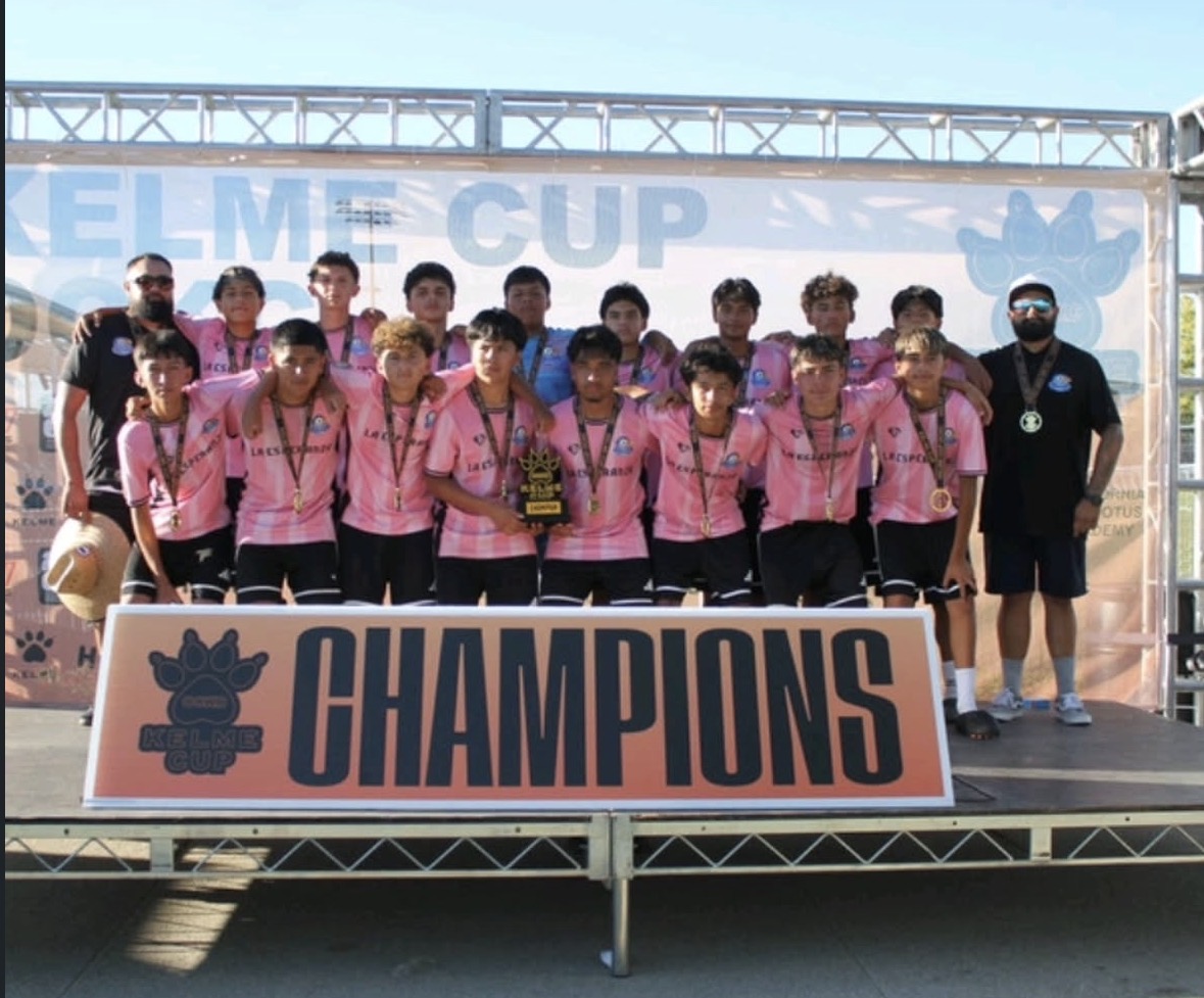 N1 B2010/11 on the KELME Cup champions podium with medals and trophy