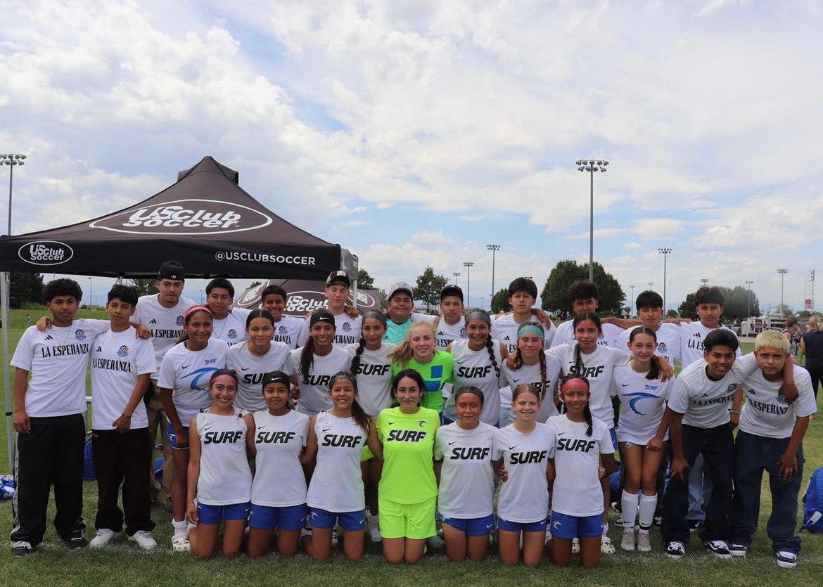 La Esperanza girls team photo under the club tent