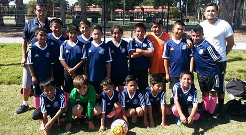 La Esperanza youth team gathered after a match