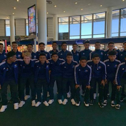 La Esperanza travel team together at the airport